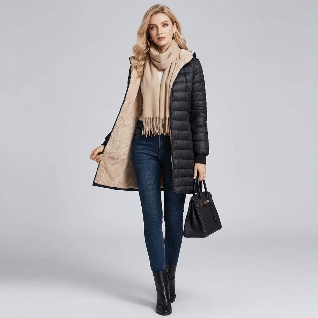 Women's long puffer coat, three quarter view with the hood up